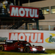 Image for article titled This is What it Looks Like to Make a Last Second Pass on the Grass at Petit Le Mans